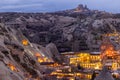 Goreme City at twilight, Famous tourist center of balloon fligths in Cappadocia, Turkiye, Aerial view twilight Goreme City from