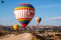 Colorful hot air balloons flying over the valley at Cappadocia, Anatolia, Turkey. Royalty Free Stock Photo