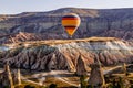 Colorful hot air balloons flying over the valley at Cappadocia, Anatolia, Turkey. Royalty Free Stock Photo