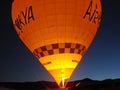 Goreme town. Cappadocia. Turkey. Balloon flight over the rocky valleys of Cappadocia at sunrise.