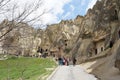 People walking around unique beautiful landscape at the open air museum historical landmark of Goreme , Cappadocia Royalty Free Stock Photo