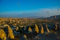 Goreme, Turkey: The great tourist attraction of Cappadocia - balloon flight at sunrise. Cappadocia is place to fly with hot air Royalty Free Stock Photo