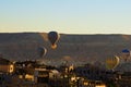 Air balloons festival in Cappadocia. Hot air balloons flying over Goreme city Royalty Free Stock Photo
