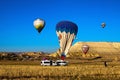 Bleeding air from the hot air balloon. Prepare for packing up of Balloon. Balloons festival in Cappadocia