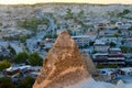 Sunset landscape view of ancient Goreme in Cappadocia. Amazing cave houses in shaped sandstone rocks