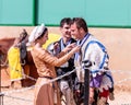 A beautiful lady who participates in the knight festival awards the winner of the fight in the lists in Goren park in Israel