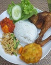 Ayam Goreng or Indonesian Fried Chicken with Telur Balado, Perkedel Jagung and Mie Goreng