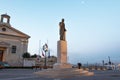 Gorg Borg Olivier statue with stock exchange building at Valletta