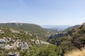 Canyon Gorges de la Nesque, gray cliffs with green forest in summer sunny day in Provence, South France