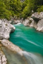 Gorge of Koritnica river in Slovenia with a bridge in the backround Royalty Free Stock Photo