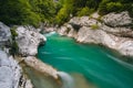 Gorge of Koritnica river in Slovenia with a bridge in the backround Royalty Free Stock Photo