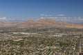 Gorgeous aerial view of Las Vegas with mountain landscape in background.