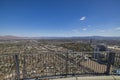 Gorgeous aerial view of Las Vegas with mountain scenery in background from observation deck.