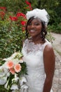 Gorgeous african american bride outside posing and smiling Royalty Free Stock Photo