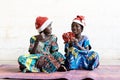 Gorgeous African Christmas Children Wearing Hats and Giving Presents