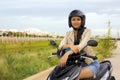 Gorgeous asian girl with motorcycle Royalty Free Stock Photo