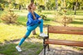 Gorgeous athletic woman working out in the park in the morning Royalty Free Stock Photo