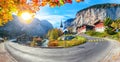 Gorgeous autumn landscape of  alpine village Lauterbrunnen with famous church and Staubbach waterfall Royalty Free Stock Photo