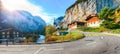 Gorgeous autumn landscape of  alpine village Lauterbrunnen with famous church and Staubbach waterfall Royalty Free Stock Photo