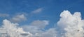 Heavenly blue skies with white cumulonimbus clouds