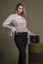 Gorgeous beautiful stylish woman posing in off white blouse Royalty Free Stock Photo