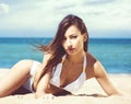 Gorgeous and beautiful young girl relaxing on a summer beach Royalty Free Stock Photo