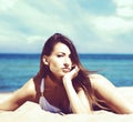 Gorgeous and beautiful young girl relaxing on a summer beach Royalty Free Stock Photo