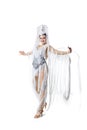 Beautiful young woman in carnival, stylish masquerade costume with feathers dancing on white studio background. Concept Royalty Free Stock Photo
