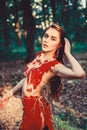 Gorgeous beauty. amazon woman. sexy witch. ethnic tribal fashion. deep forest. wild woman in forest. cougar female. sexy