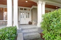 Gorgeous big Craftsman home with lovely covered porch. Royalty Free Stock Photo