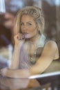 Gorgeous Blonde Model Posing Near A Cafe Royalty Free Stock Photo