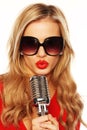 Gorgeous Blonde In Sunglasses With Microphone