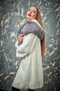 Dreamy woman in furs Royalty Free Stock Photo