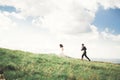 Gorgeous bride and stylish groom walking at sunny landscape, wedding couple, luxury ceremony mountains with amazing view Royalty Free Stock Photo