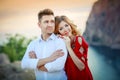 Gorgeous bride and stylish groom walking at sunny landscape, wedding couple, luxury ceremony mountains with amazing view Royalty Free Stock Photo