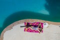 A Lovely Brunette Swimsuit Model Enjoys Her Holiday At The Pool Royalty Free Stock Photo