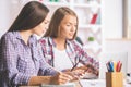 Gorgeous businesswomen working on project Royalty Free Stock Photo