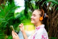 Gorgeous caucasian woman is listening nice music that can heal d Royalty Free Stock Photo