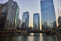 Gorgeous Chicago, IL canal at dawn with reflective blue windows of skyscrapers, tourism, travel