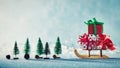 Gorgeous christmas presents on Santas sleigh. Miniature Christmas winter wonderland. Xmas greeting card.