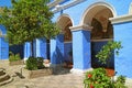 Gorgeous Cloister with Vibrant Blue Columns and Wall Fresco Paintings in Santa Catalina Monastery, Arequipa, Peru