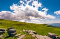 Gorgeous cloudscape over the grassy hillside