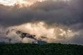 Gorgeous cloudscape over the mountains at sunrise Royalty Free Stock Photo