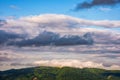 Gorgeous cloudscape over the mountains at sunrise Royalty Free Stock Photo