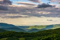 Gorgeous cloudscape over the mountains at sunrise Royalty Free Stock Photo