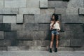 Brazilian girl and displacement wall