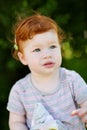 Gorgeous cute red haired little girl