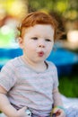 Gorgeous cute red haired little girl