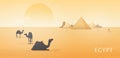 Gorgeous Egypt desert landscape with silhouettes of camels standing and lying against Giza pyramid complex, statue of