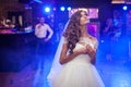 Gorgeous emotional bride in white dress